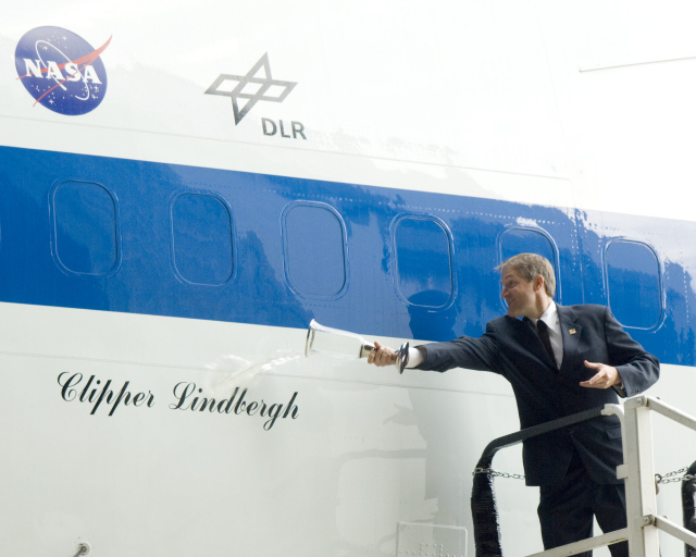 Erik Lindbergh christens the "Clipper Lindbergh"